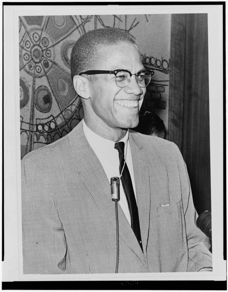 Black and white photographic print of Malcolm X, 1964